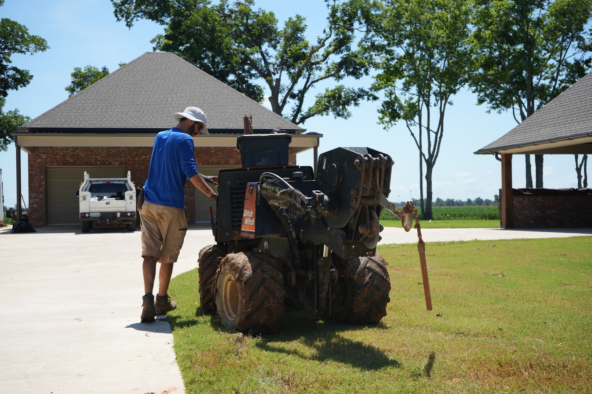 All Star Sprinkler Systems crew laying out an irrigation line