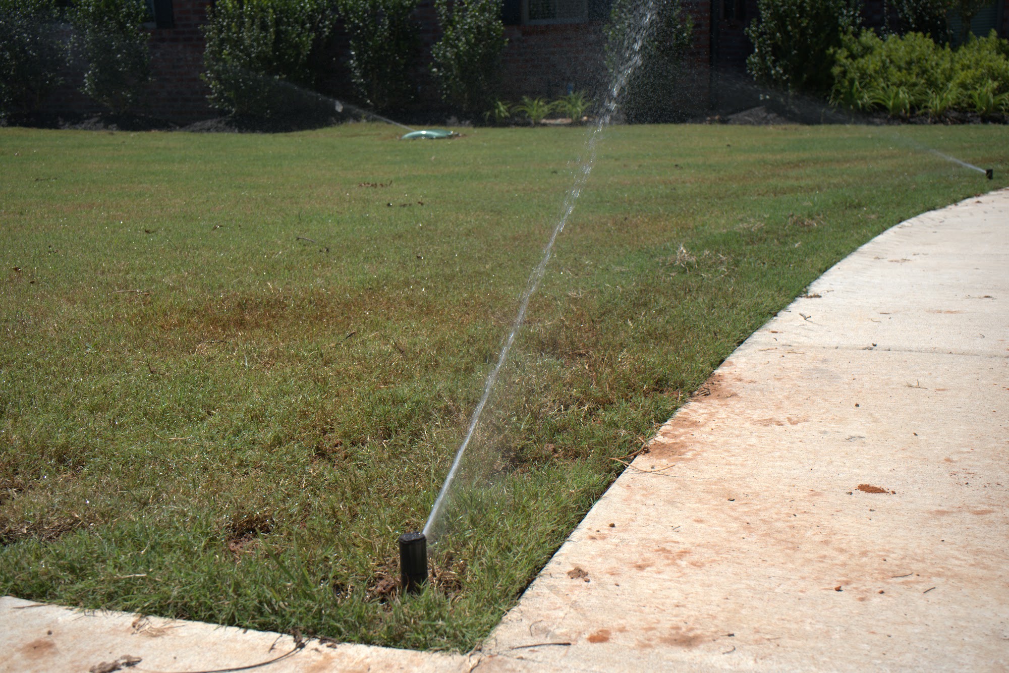 All Star Sprinkler Systems crew marking an irrigation layout