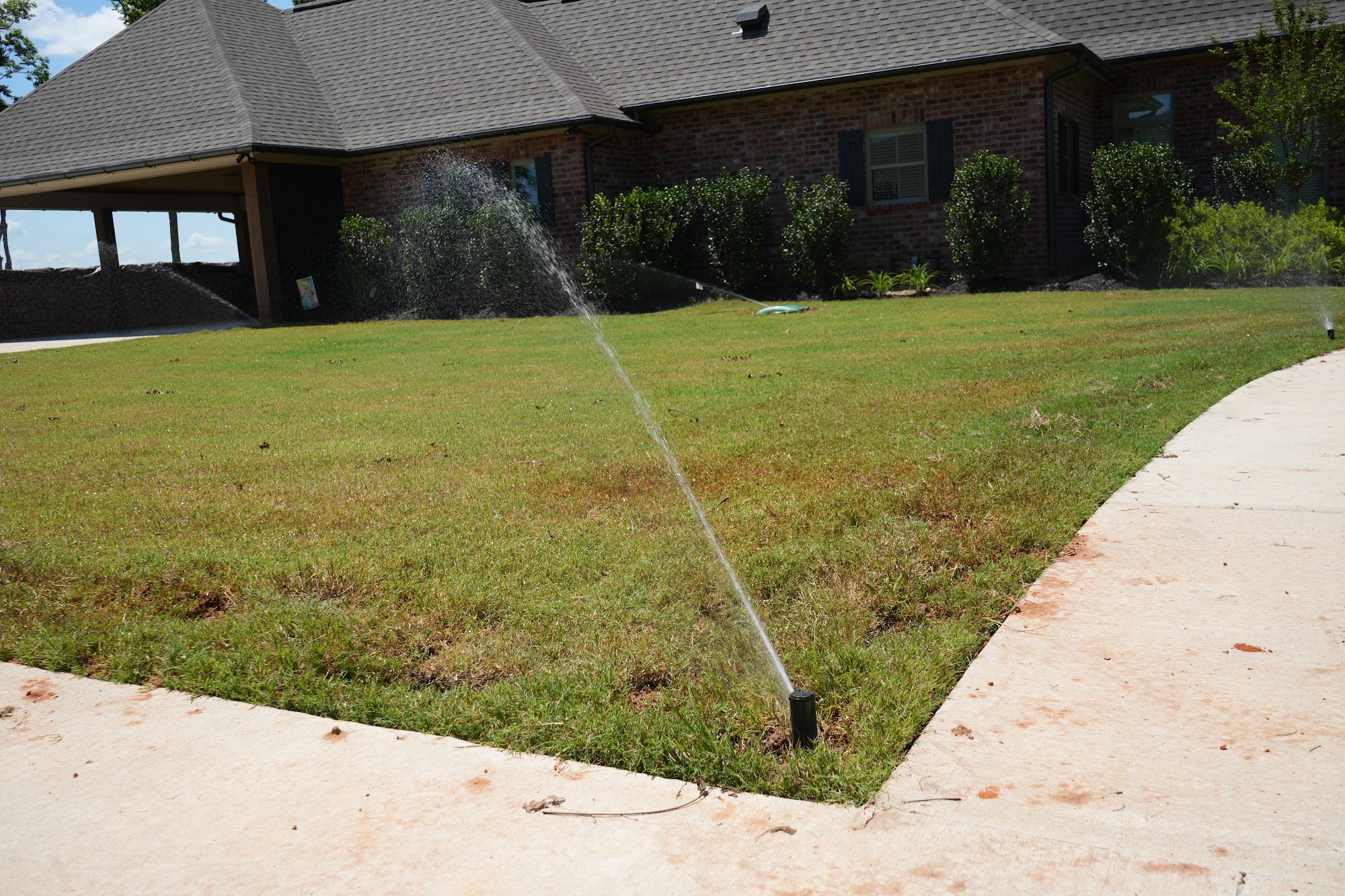 Sprinkler head running during an irrigation system test